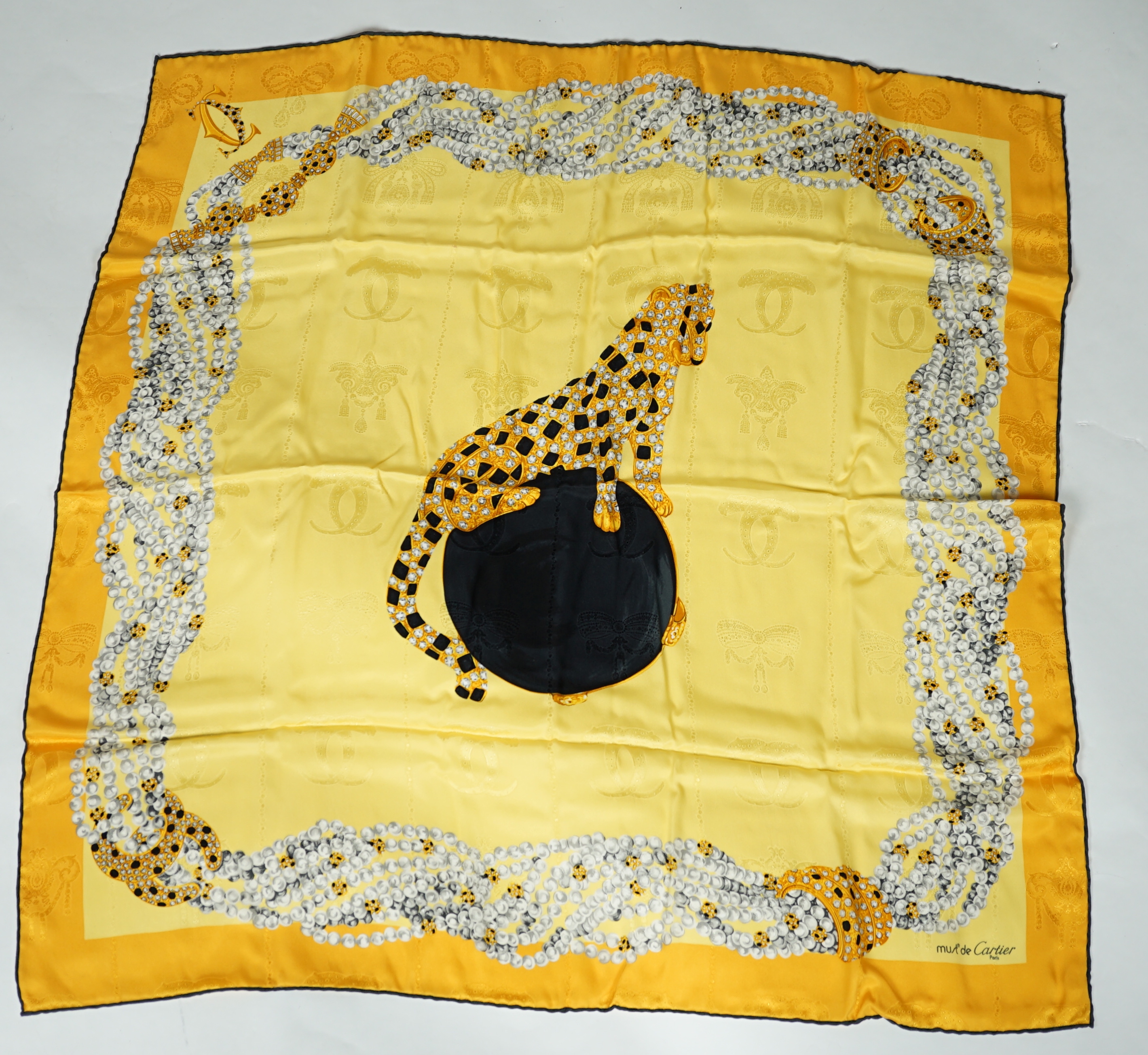 A Louis Vuitton, Cartier and Pucci boxed scarves